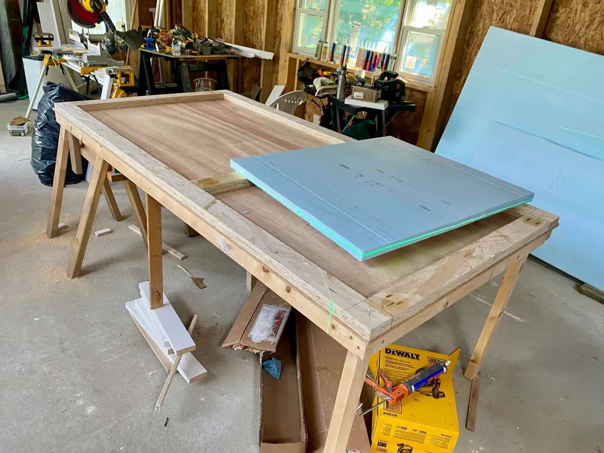 I built a 500 sq ft backyard shed studio for my photography business. I personally handled every phase from design to completion except for concrete, electrical, and HVAC. It's insulated and comfortable year round here in New Hampshire.  Ask me anything!