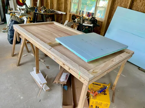 I built a 500 sq ft backyard shed studio for my photography business. I personally handled every phase from design to completion except for concrete, electrical, and HVAC. It's insulated and comfortable year round here in New Hampshire.  Ask me anything!