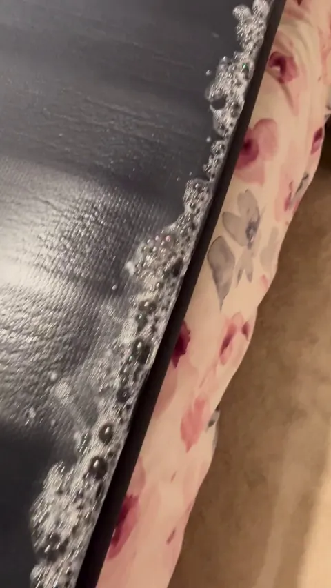 Attempting to find the puncture in our camping mattress