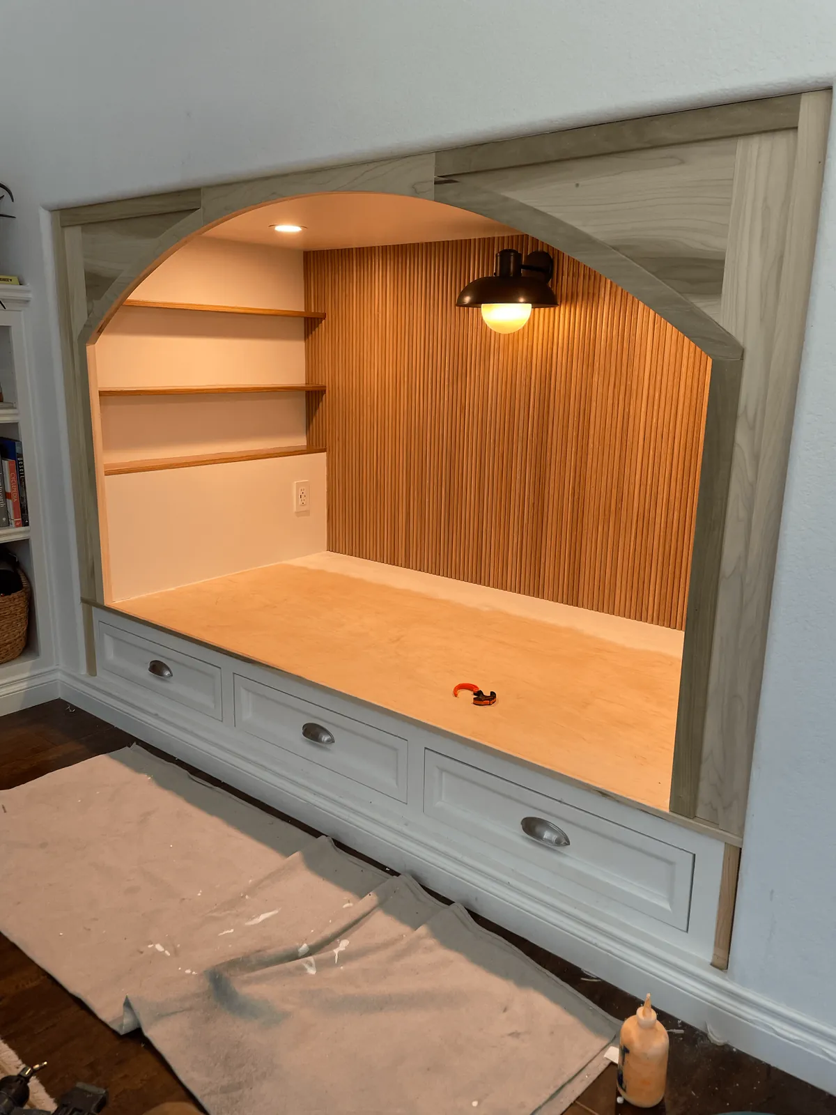 We transformed our 90s entertainment center in a reading nook
