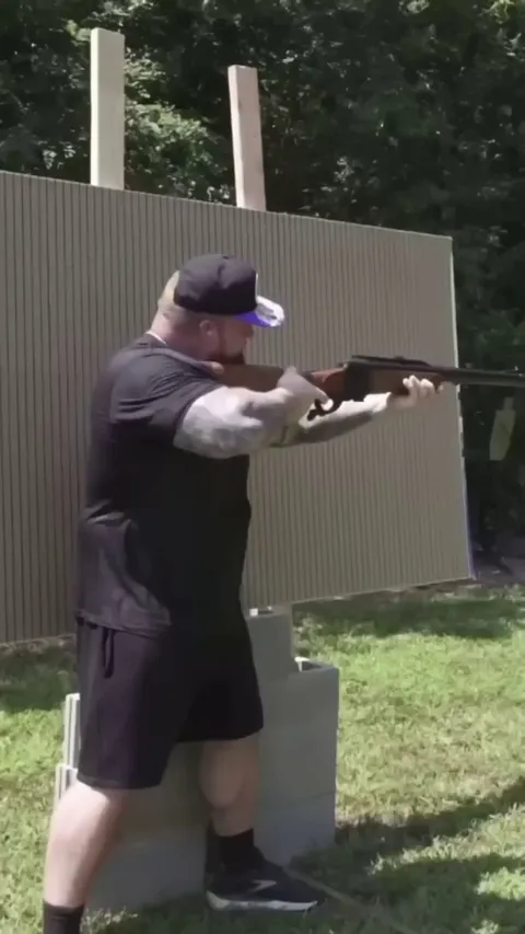 World’s strongest man vs World’s strongest rifle.