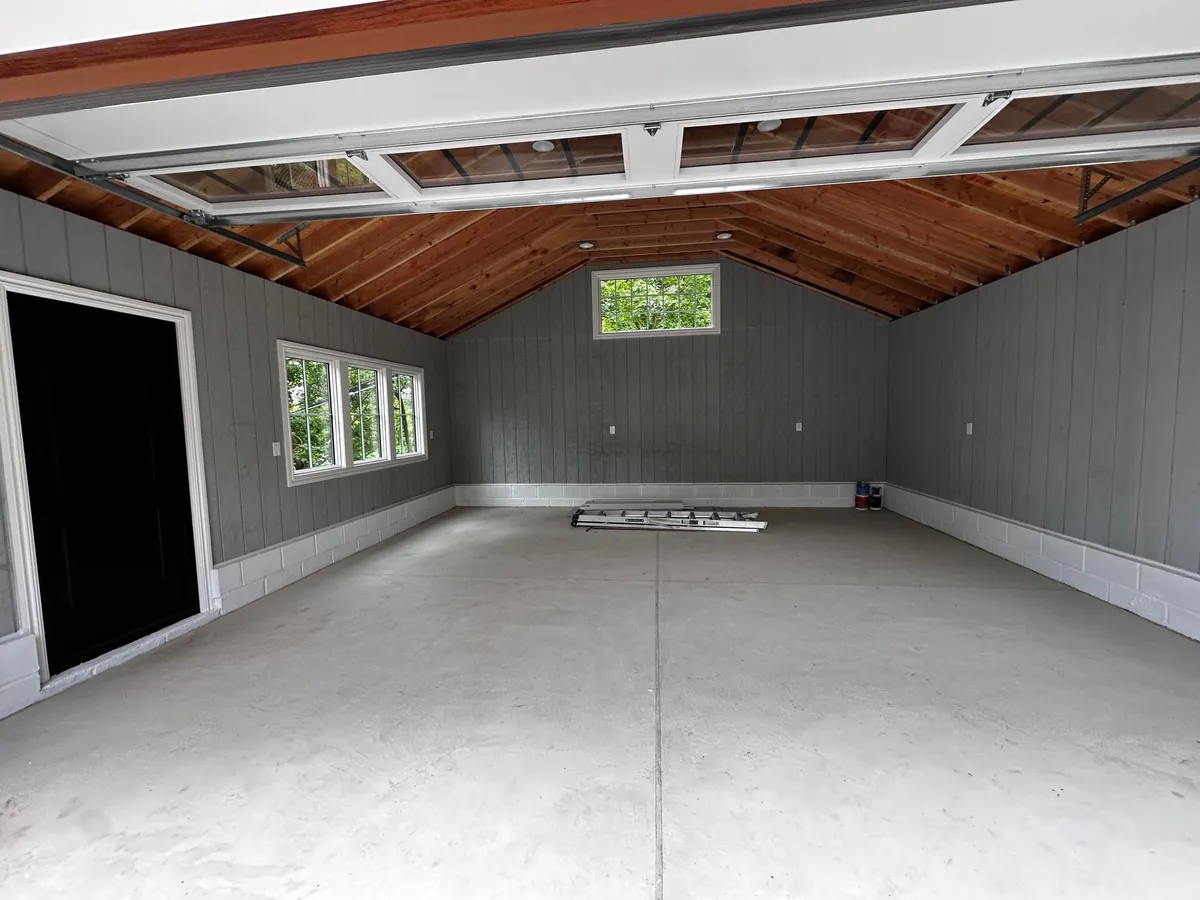 Before and after neighbor’s tree fell on our garage.