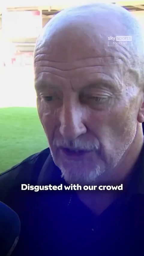 Swindon Town boss lan Holloway 'disgusted' after an object was thrown towards Walsall's goalkeeper from the crowd