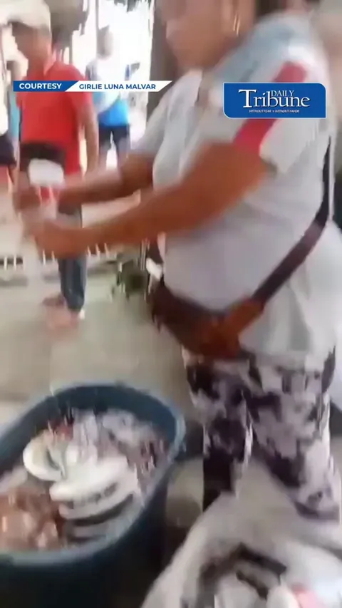 A fish vendor poured bleach and detergent over her confiscated fish, saying she wanted to make sure the goods could no longer be sold