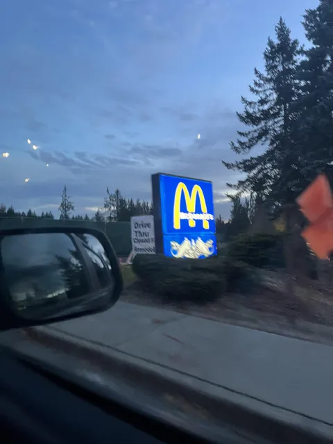 I drove by a mcdonald’s with a blue sign instead of a red one.