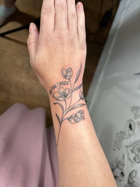 4 unbloomed flowers for the babies I never got to meet; 1 bloomed flower for the one I get to forever keep.