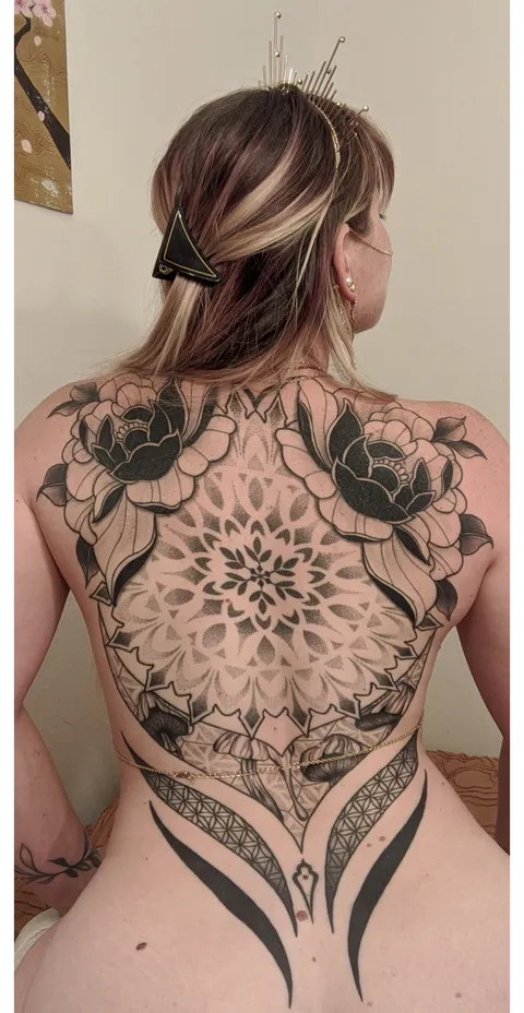 My back piece done by Christian Faith at West side Tattoo shop in Colorado 