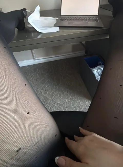 A horny mature milf needing to kill some time in a hotel room before her next meetings. I