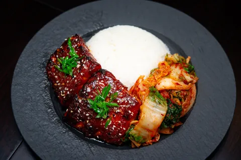 [homemade] miso, gochujang, honey salmon with sushi rice and kimchi.