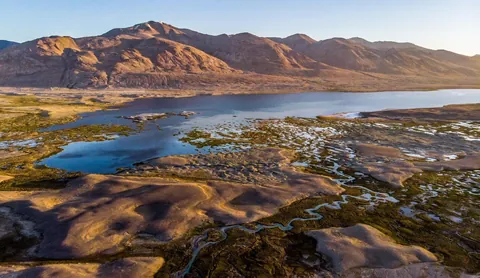 Pamirs of the Wakhan Corridor in Afghanistan. I walked alone across the border bridge at Ishkashim, hitched a ride then hired a donkey and walked up the valley for a week, then hired a horse and rode into the mountains for three weeks. Best trip ever!