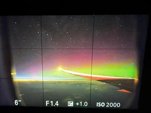 Last night's aurora next to a plane window
