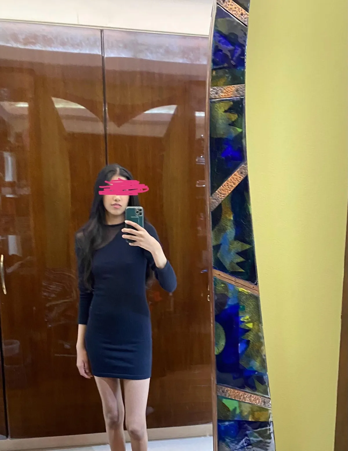 Swipe to see what’s under my tight black dress