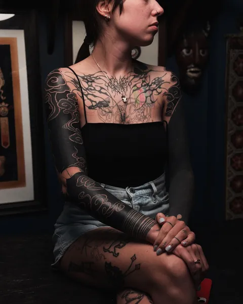 Cloudy sleeves coverup in progress by Danylo Shvarov based in Good Sign Warsaw, Poland (left arm blackwork is not mine)