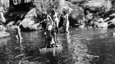 13-year-old Barbara Kent (center) and her fellow campers play in a river near Ruidoso, New Mexico, on July 16, 1945, just hours after the Atomic Bomb detonation 40 miles away. Barbara was the only person in the photo that lived to see 30 years old.