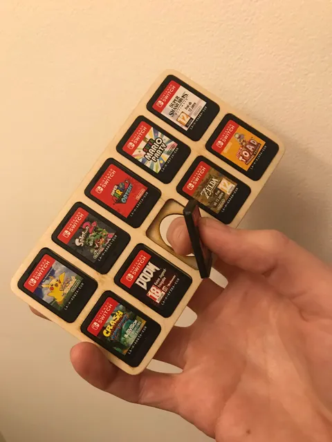 A student from the school I work at laser cut this cartridge holder for me out of 3mm plywood. Thought it was a very clever and simple solution.