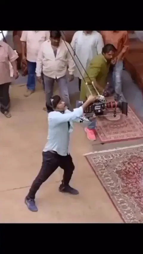 The behind-the-scene of shooting an action scene in a South Indian movie.