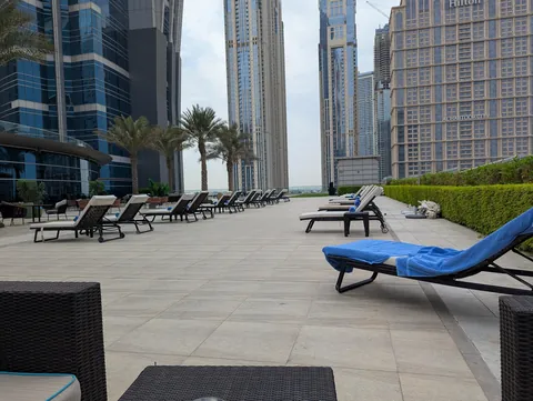 50 free lounge chairs in pool terrace and this guy picks the one closest to my corner and moved it next to me. Why?