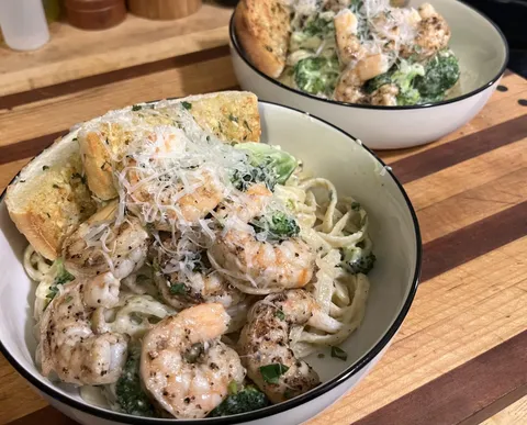 Pasta night. Shrimp Alfredo w/ broccoli and homemade garlic bread. 
