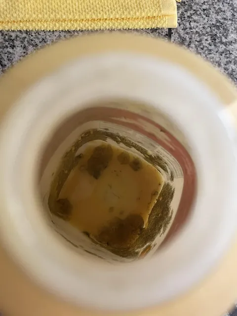 took the lid off the white chocolate sauce i've been putting in my coffee every day for a month