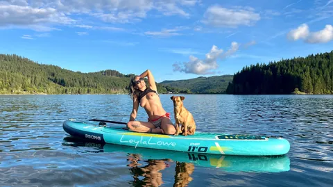 Guys fishing on the lake were totally distracted