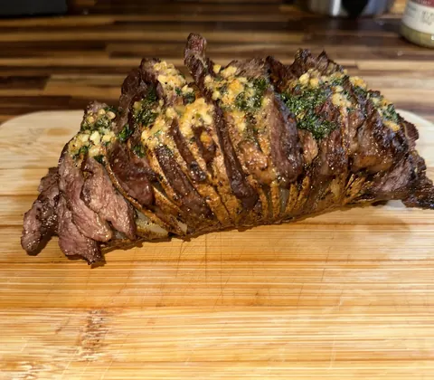[Homemade] Steak stuffed hassleback potato w cowboy butter