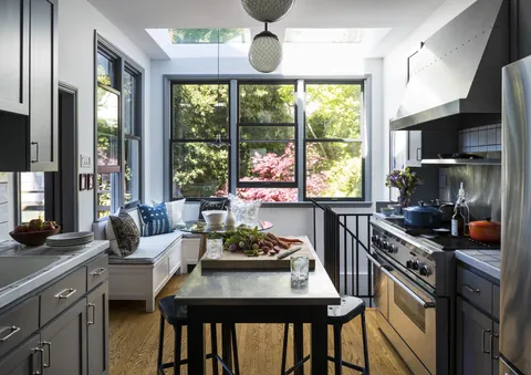 Kitchen and dining space with a skylight in a renovated Noe Valley residence, San Francisco [2500x1768]