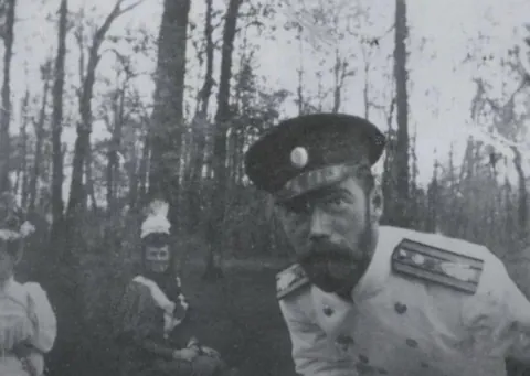 Tsar Nicholas II, He's probably examining the camera lens.