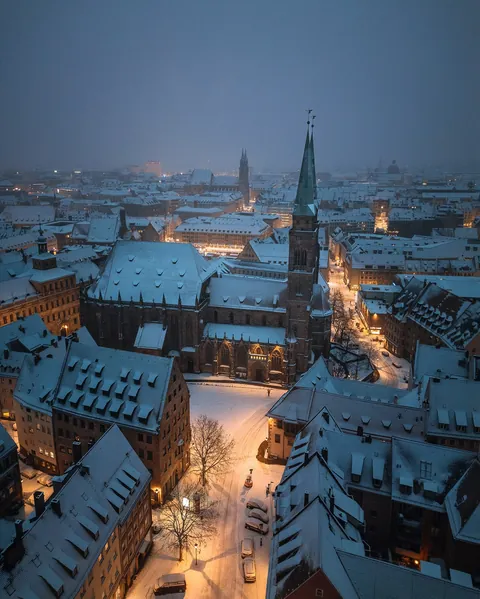 13th-century St. Sebaldus Church with later additions in the winter night, Nuremberg, Bavaria, Germany.
