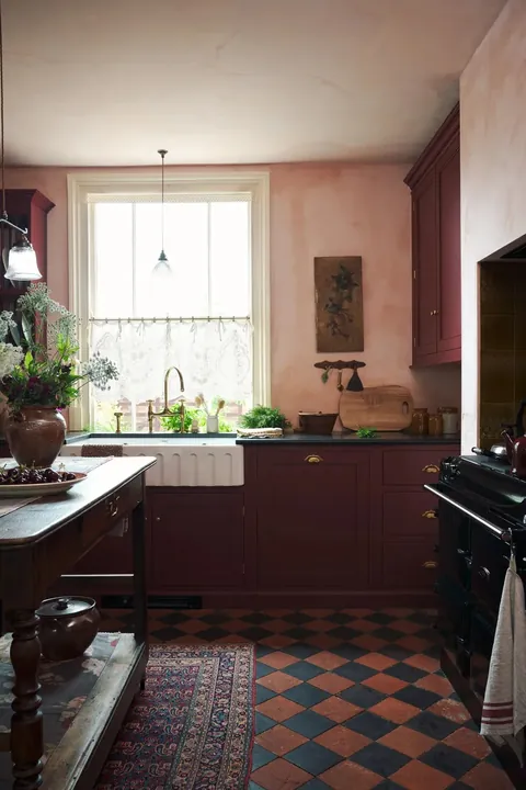 Kitchen with plaster pink limewashed walls in Nottinghamshire, East Midlands, England [1067x1600]