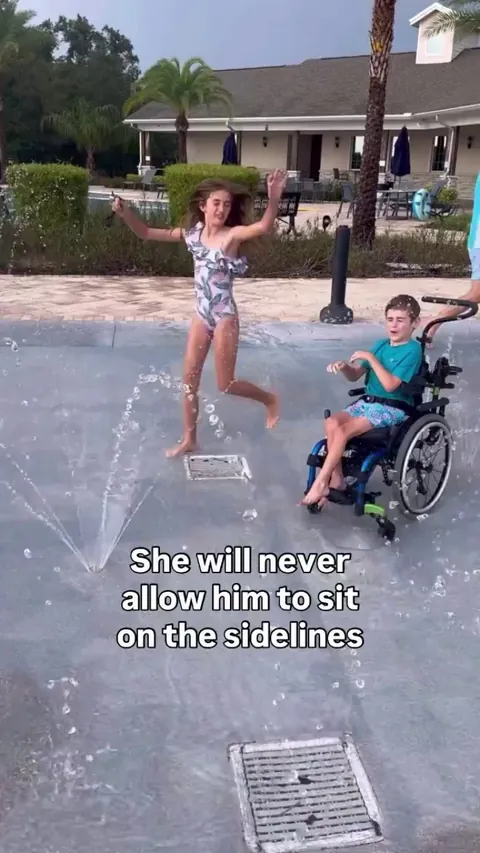 Girl always makes sure to include her disabled little brother.