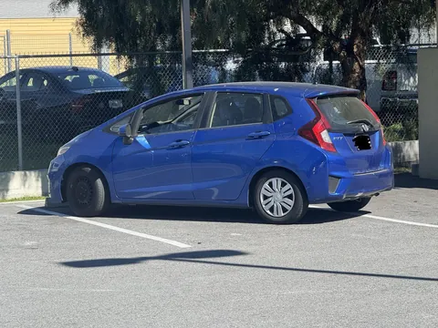 Does he really need 2 spots for this shitbox?