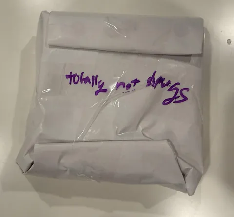 Gift wrapped amazon gift card my son received from his classmate