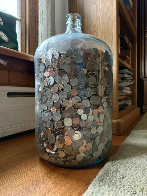 My Grandpa saved his change in this glass jug for 70 years, and is finally letting me count it!