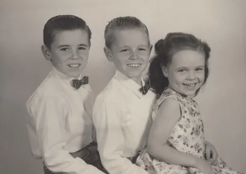 My mom's annual Christmas cards included a portrait of my big brothers and me. 1953-1959