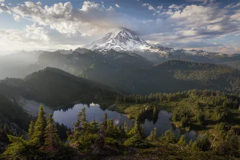 Sunrise over Mount Rainier just after a lightning storm rolled through. [OC][2000x1333]