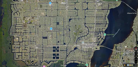 I just saw that Fort Myers and Cape Coral were expecting 10+ feet of storm surge - so I thought I'd open up a satellite image and see how well they were protected...