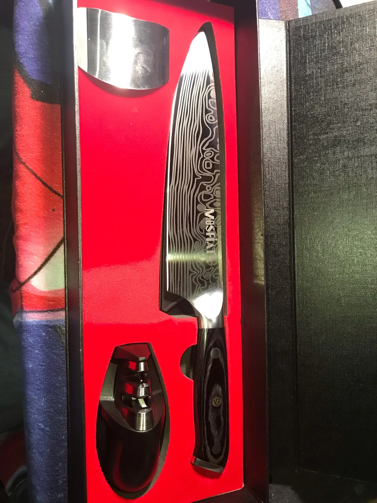 My teacher got me a knife for grad.