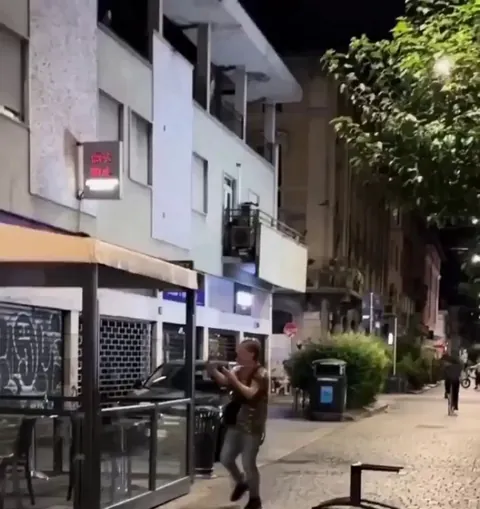 Barman disarms guy with a knife using tables and a chair