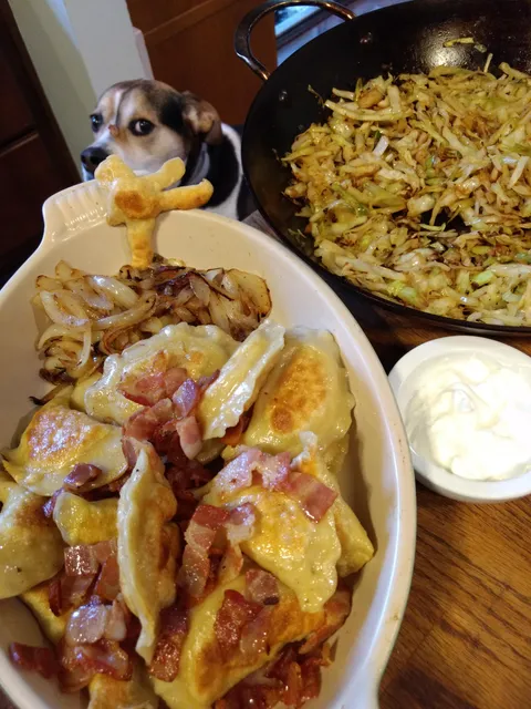 Pierogi with bacon and onions, and sauteed cabbage