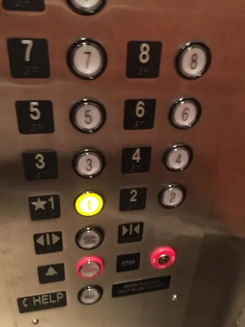 The close-door button fell off, revealing it was never connected to the control panel.