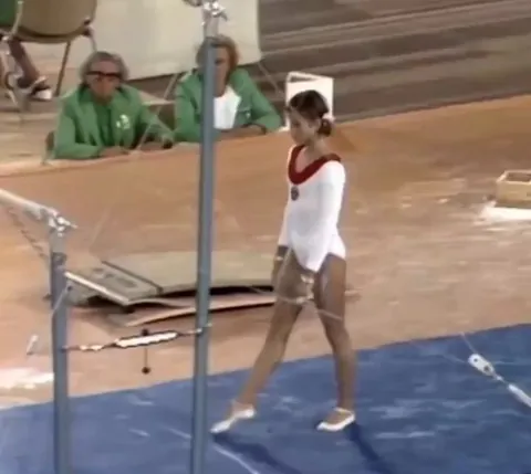 The banned "Dead Loop" of Olga Korbut in the 1972 Olympics.  It was the first and last time the trick was documented.
