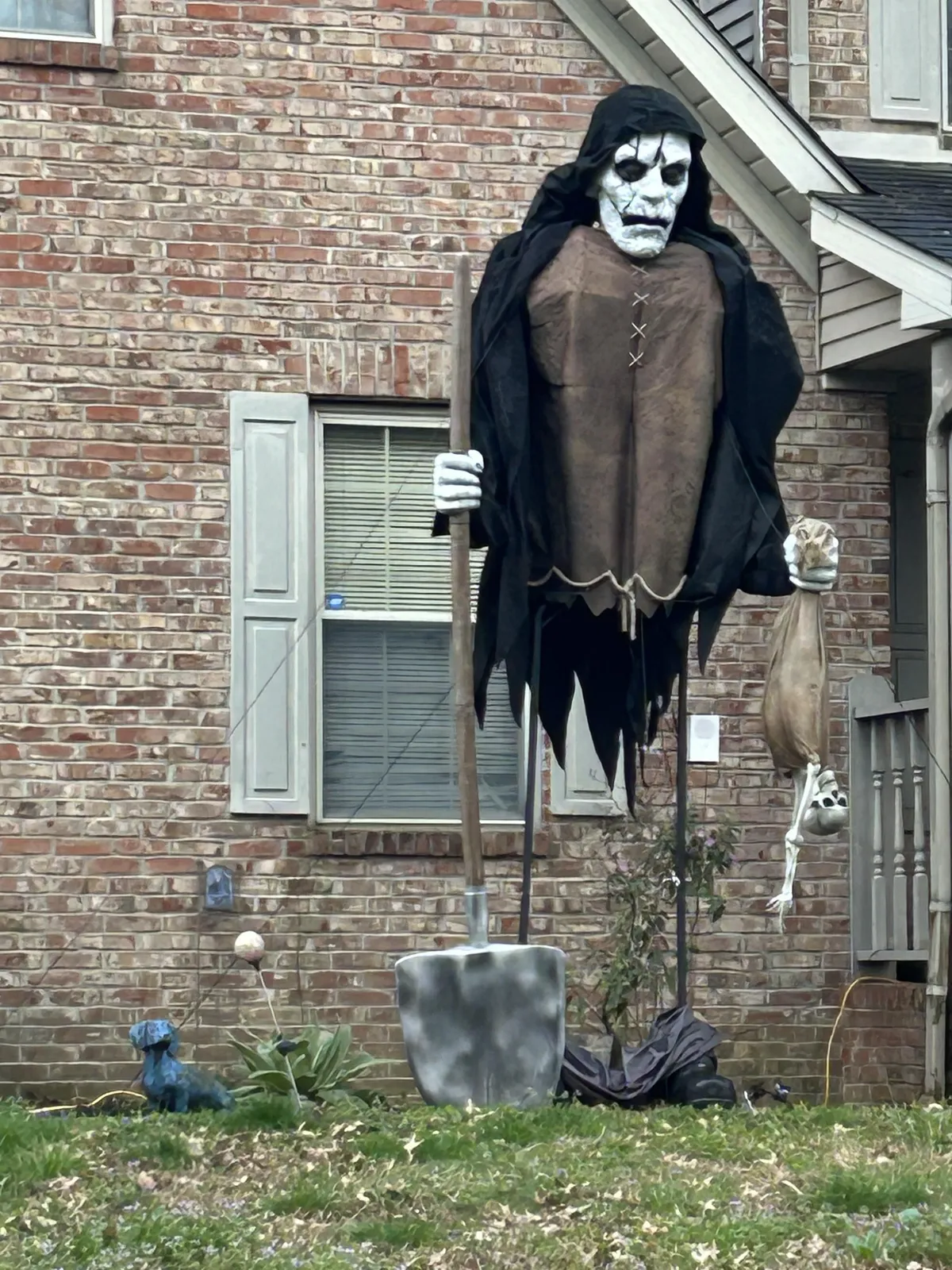 Our neighbor’s Halloween decoration has been out for so long its pants fell down.