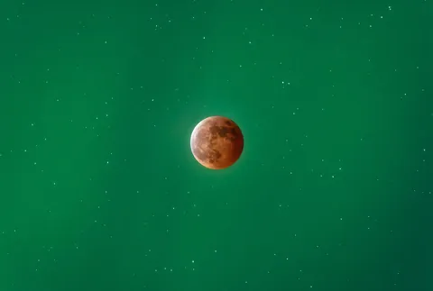 Lunar Eclipse Meets Aurora substorm