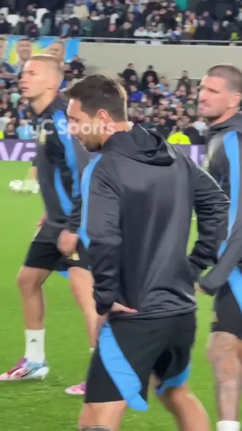 Messi can't contain himself as the Argentinian crowd chants his name