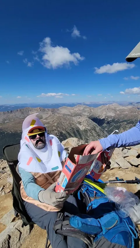 Dude lugged up dry ice and boxes of ice cream sammies to give to passing hikers