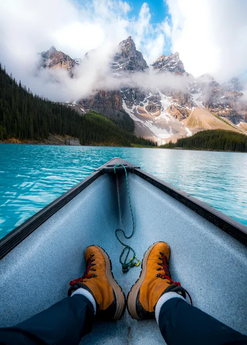 ITAP of my POV on a canoe in an alpine lake