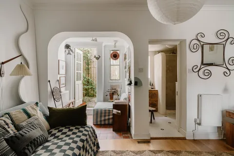 Archway nook with the rear door in a terraced house, West Norwood, Lambeth, London, UK [1600x1067]