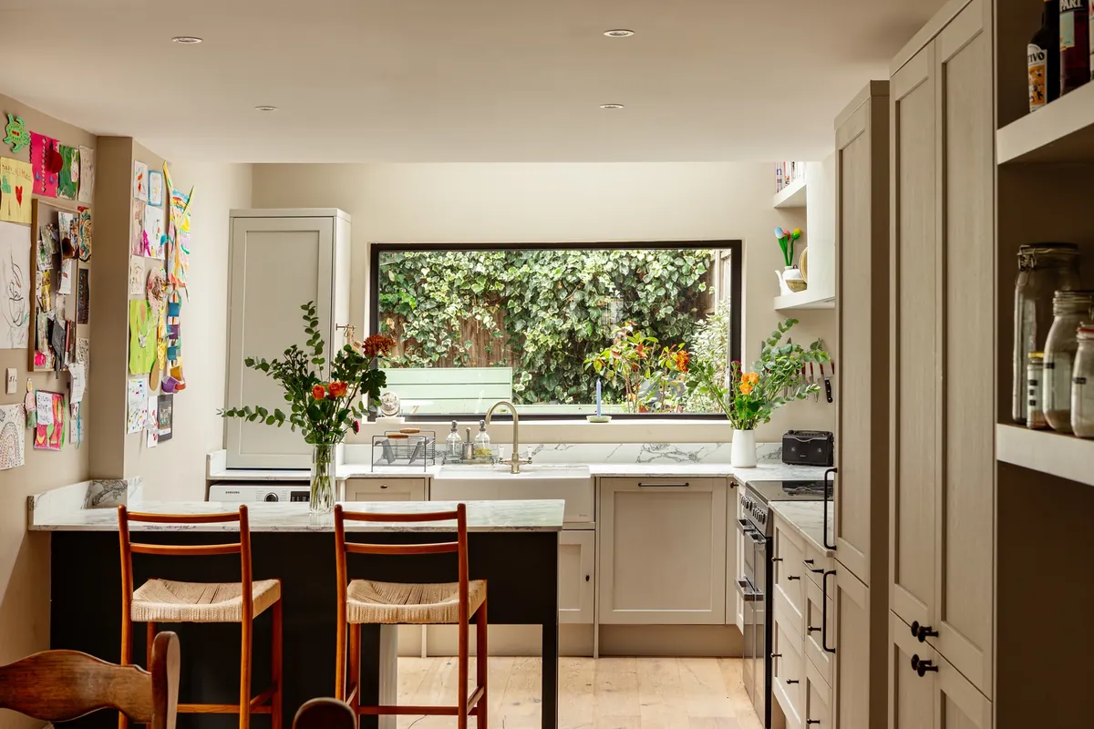 Kitchen with a wide window in a renovated Victorian terrace, East Dulwich, Southwark, South East London, UK [1600x1067]
