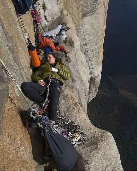 hanging “beds” are called portaledges.. collapsible platforms used by climbers during multi-day ascents