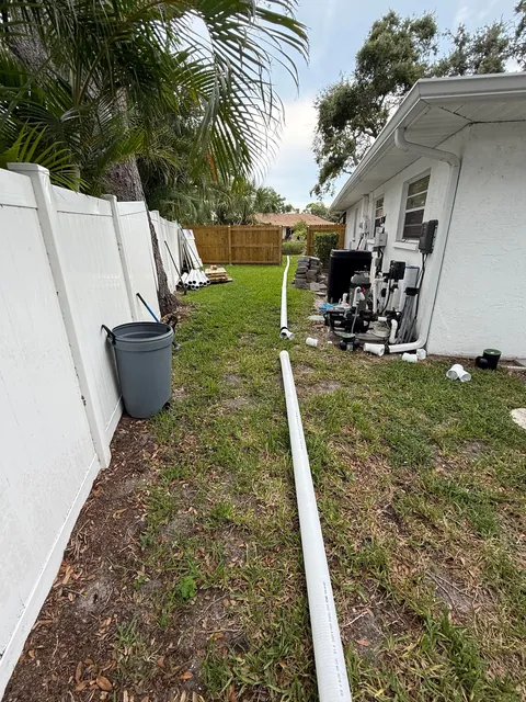 Hurricanes kept flooding my backyard so I buried 140ft of drainage pipe to prevent it.